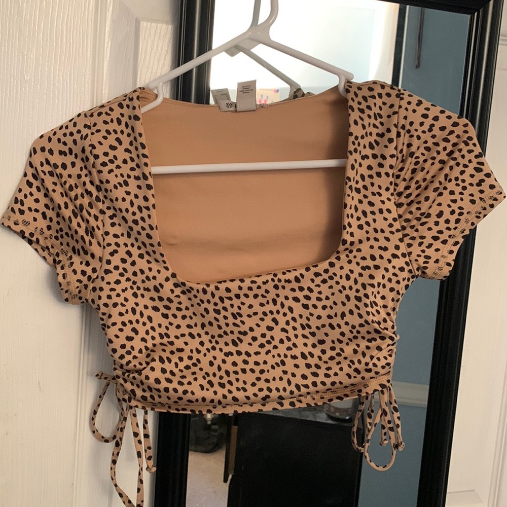 Tan and black animal printed crop top size xs